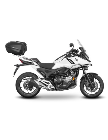 Fijaciones para montar una maleta superior a la moto.